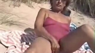 Step mommy with Bushy Cookie Filmed Nude on the Public Beach