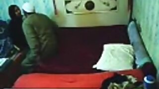 tapes an arab hijab girl having missionary sex with a guy on the bed