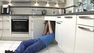 Plump housewife helps plumber