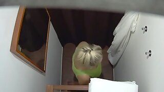 Busty mature blonde in a massage parlor